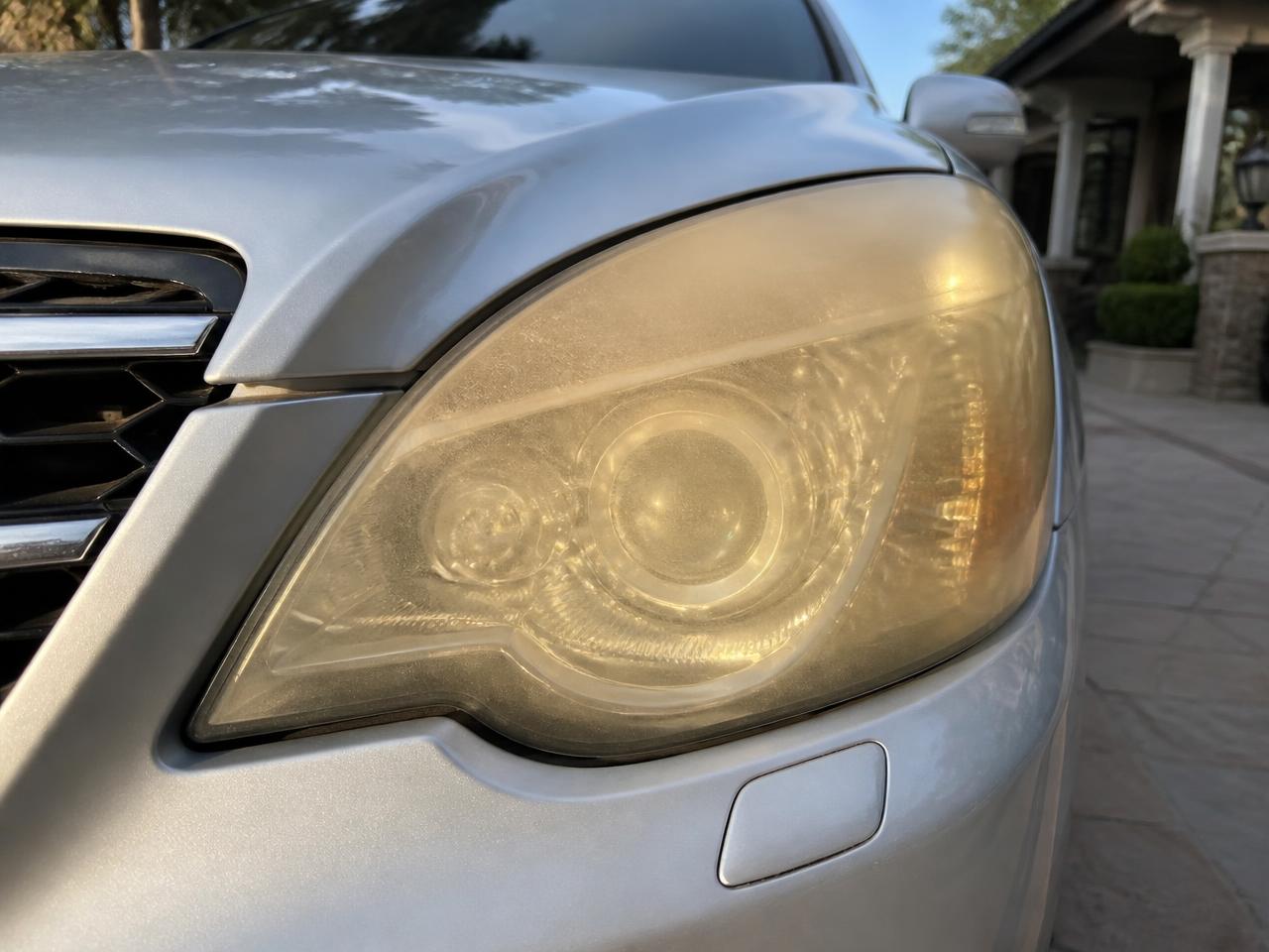 Silver crossover — Plano headlight before restoration